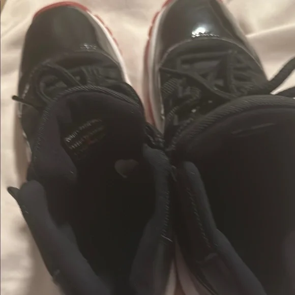 Air Jordan 11 Retro Black and Red Sneakers - Picture 6 of 7